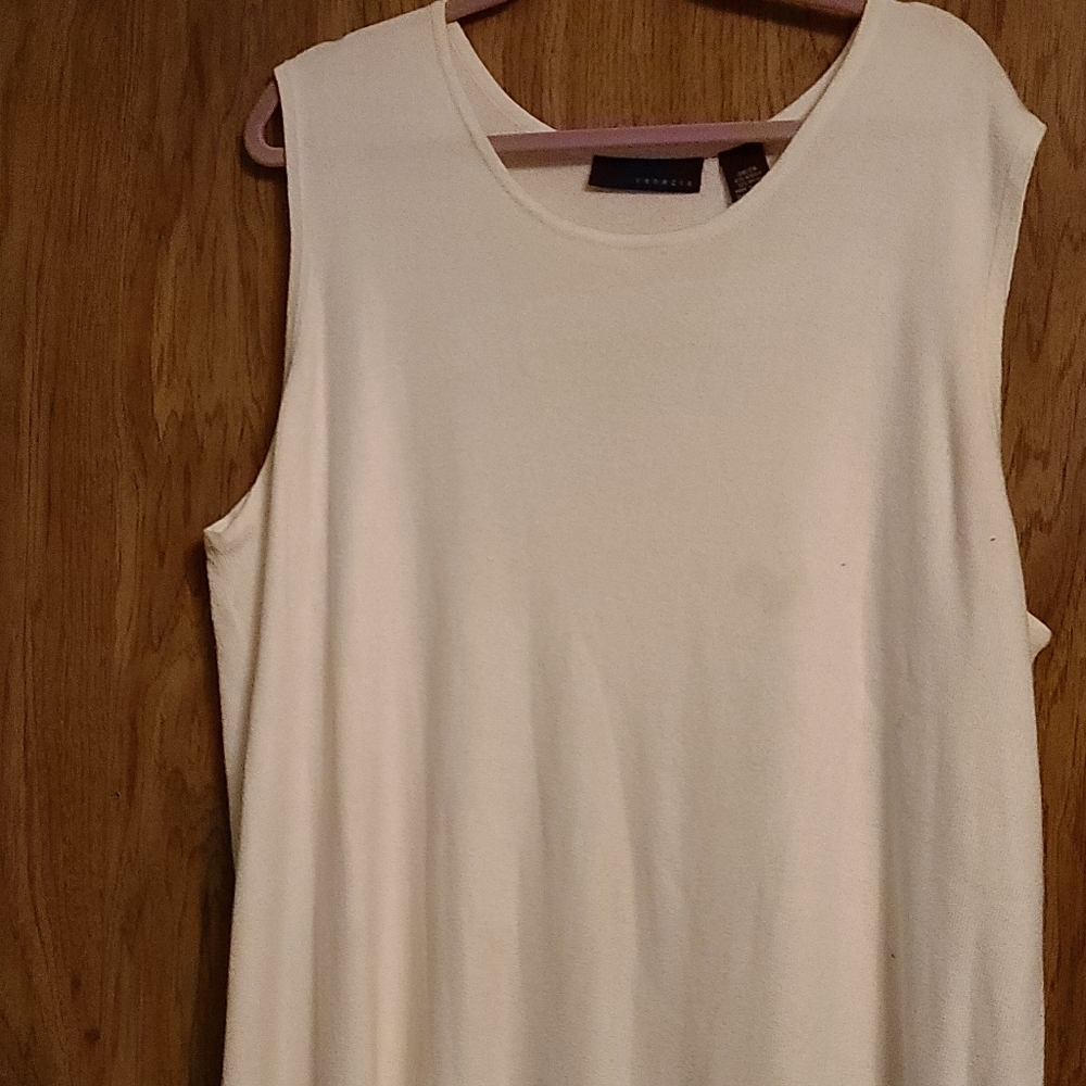 Cream knit sleeveless sheath.